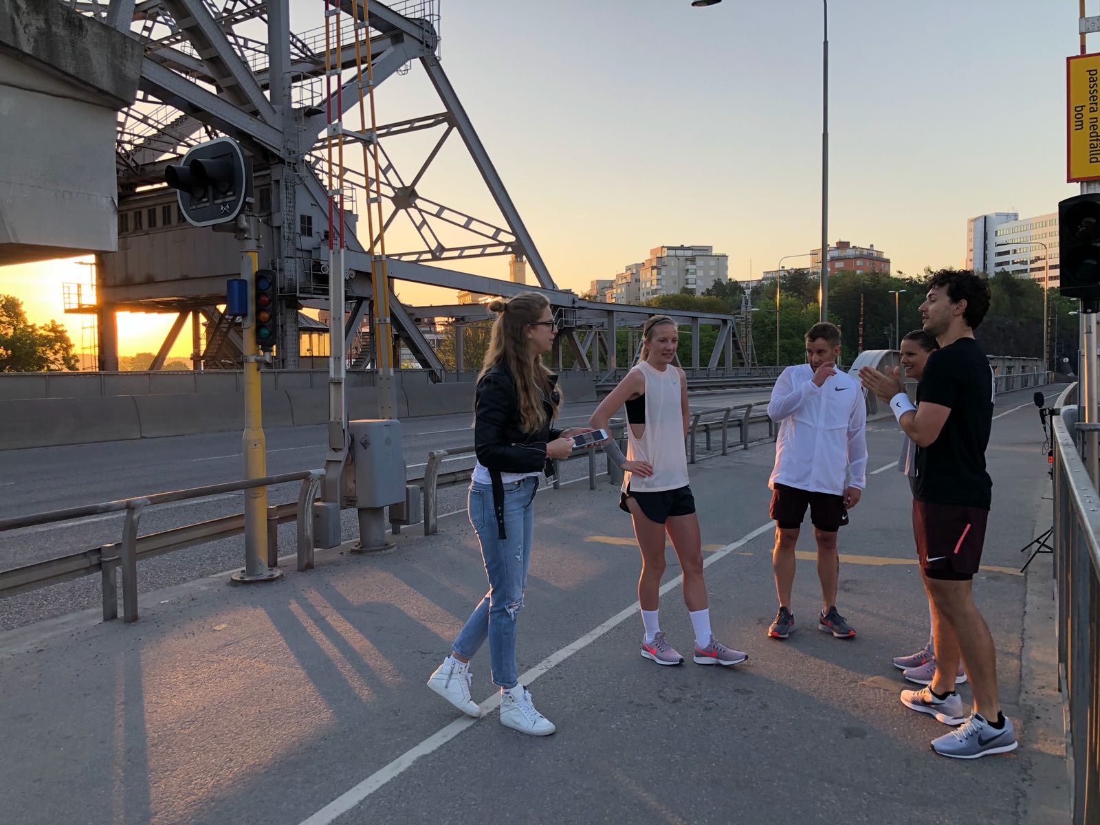 Teodora on set with her filming crew at sunset