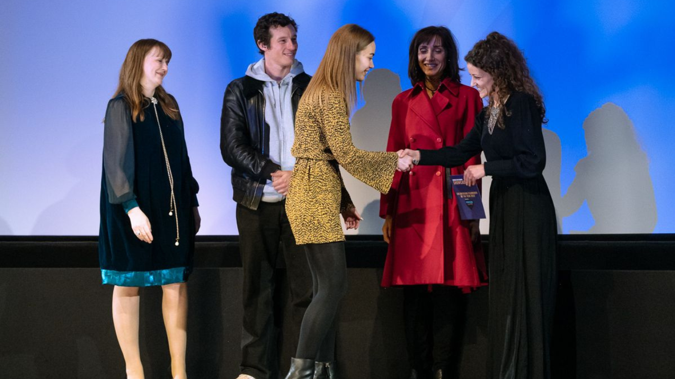 Katy accepting the award on stage at the annual showcase for LFA