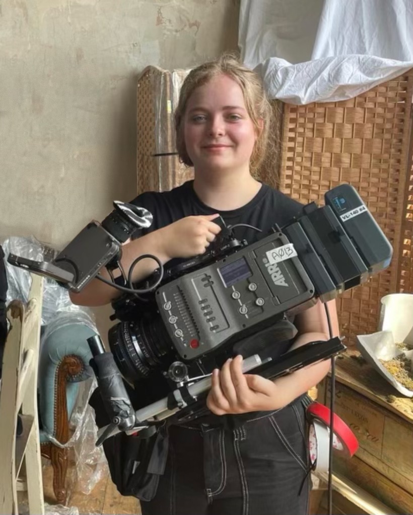Abby Dowsett LFA Alumni holding a camera
