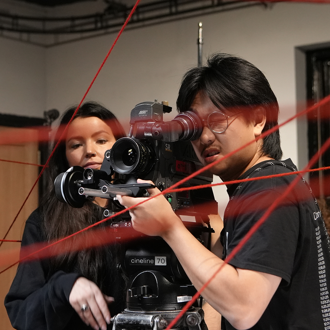 Two students with digital film camera