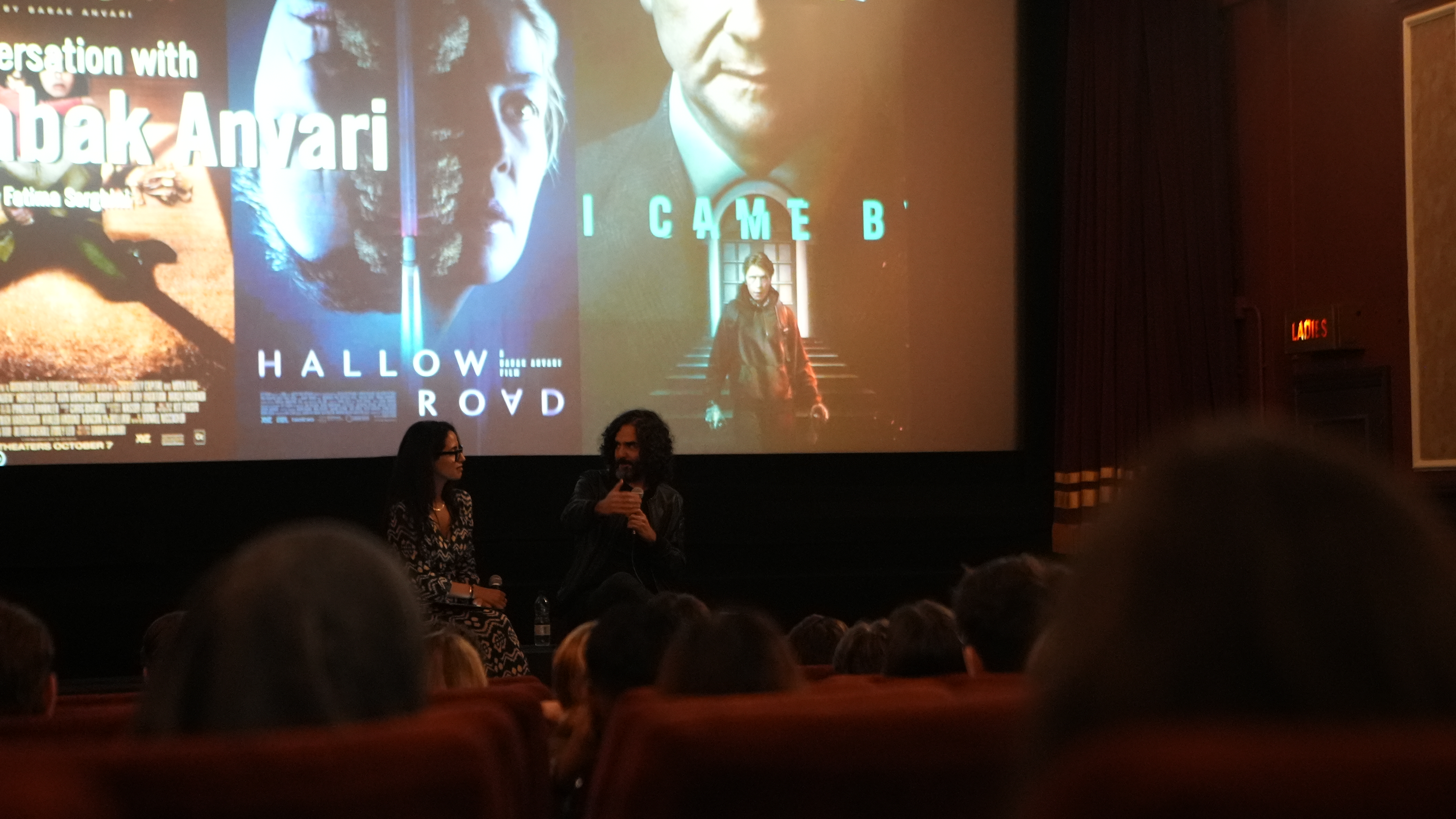 Director Babak Anvari onstage talking to LFA students
