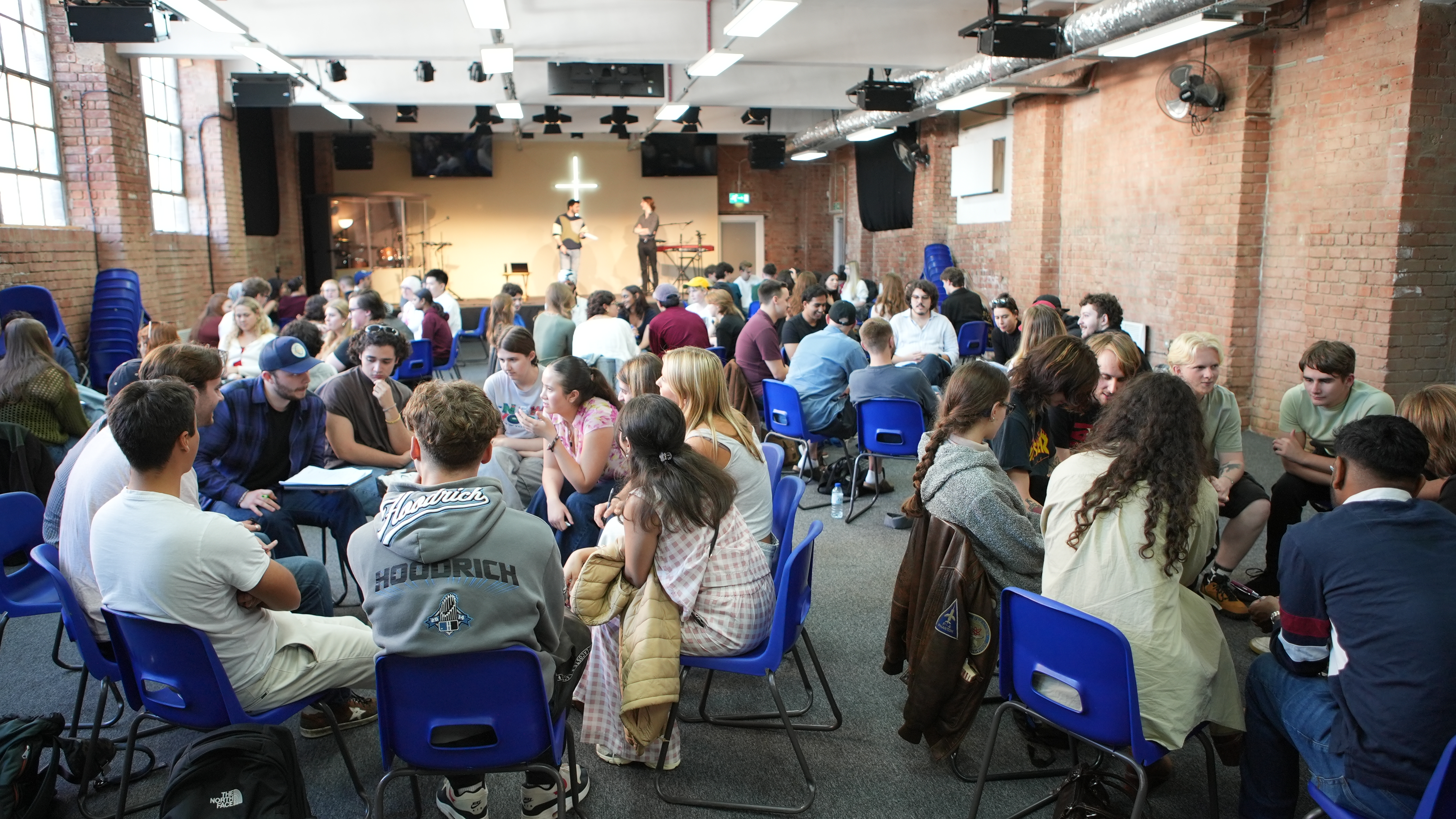 Students taking part in film quiz in groups of ten