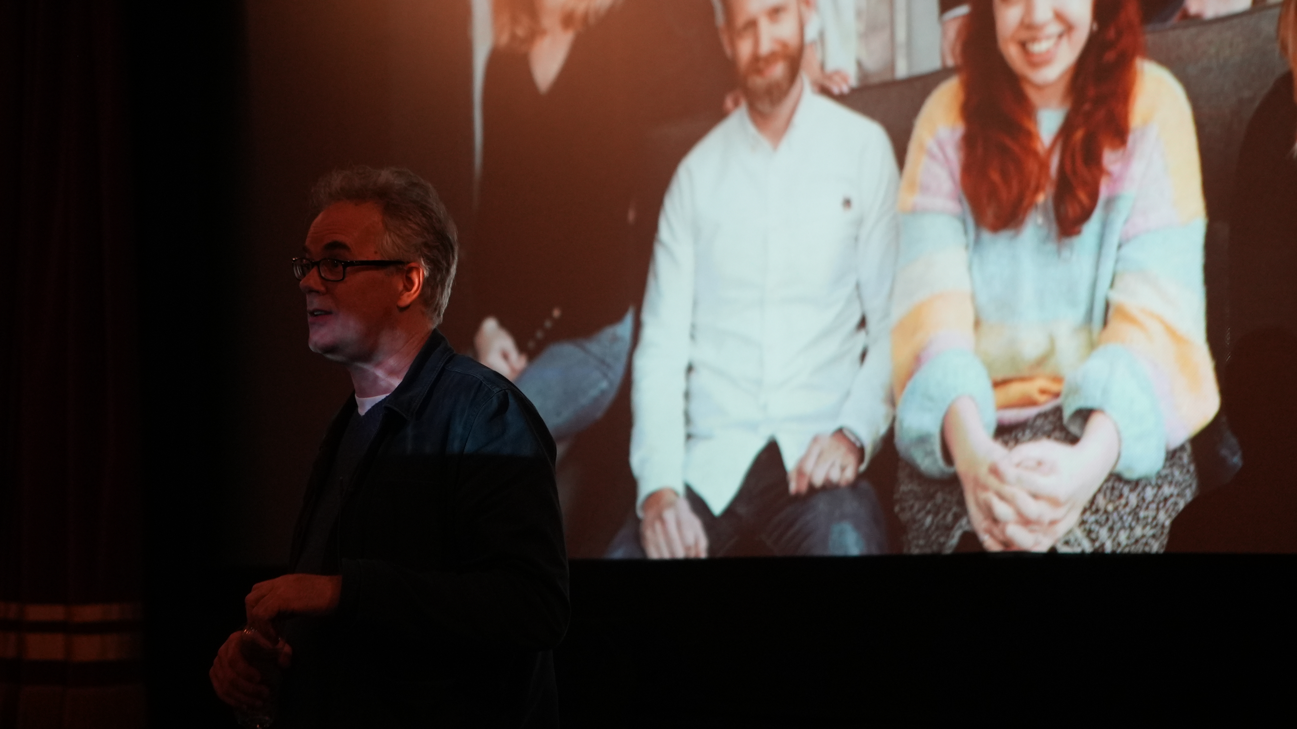 Eddie Hamilton on stage talking