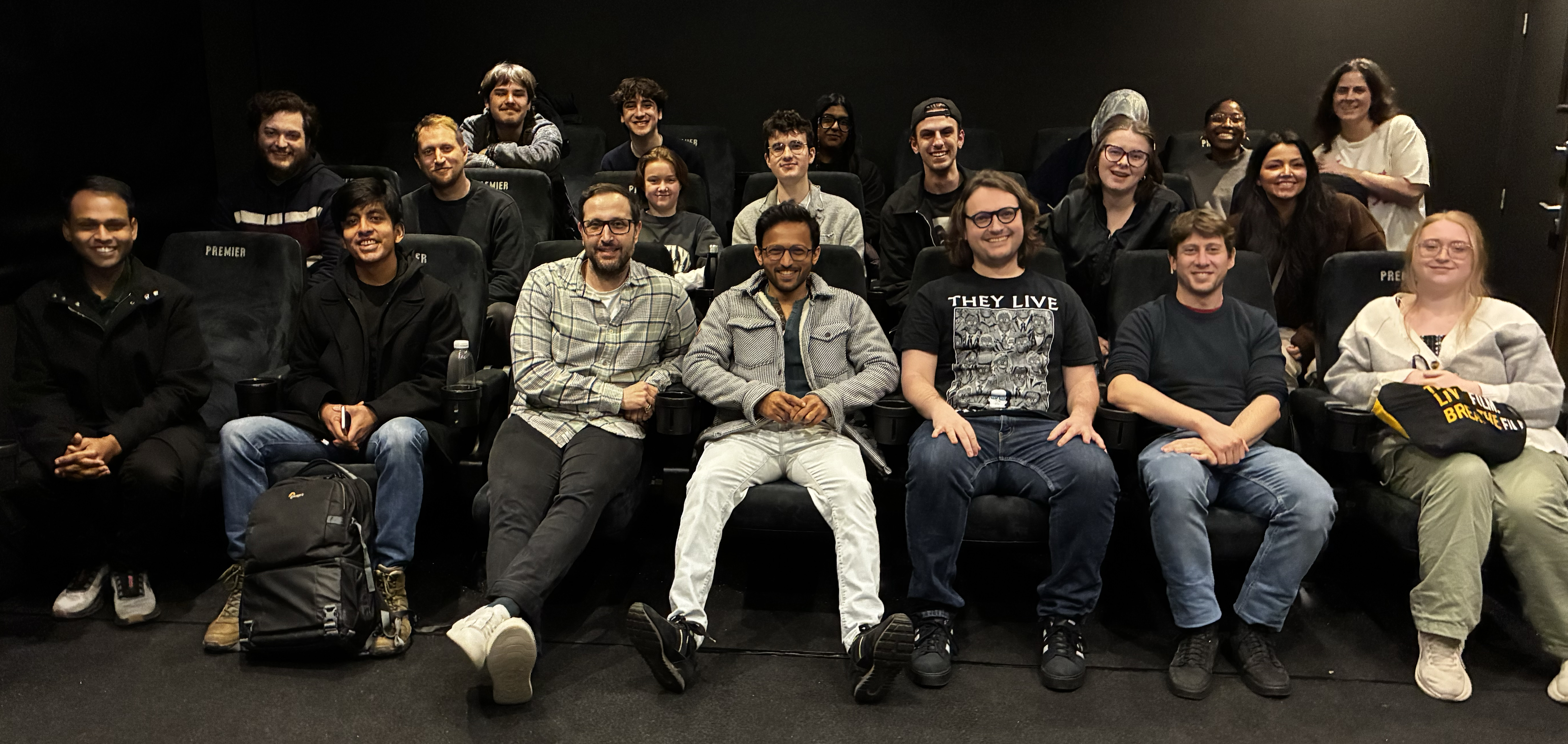 Cinema full of smiling filmmakers and students