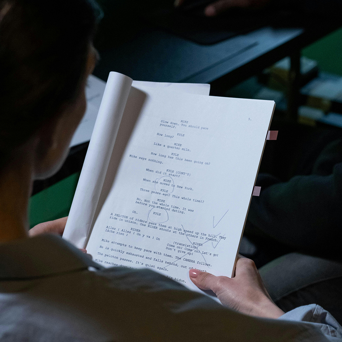Student looking at screenplay