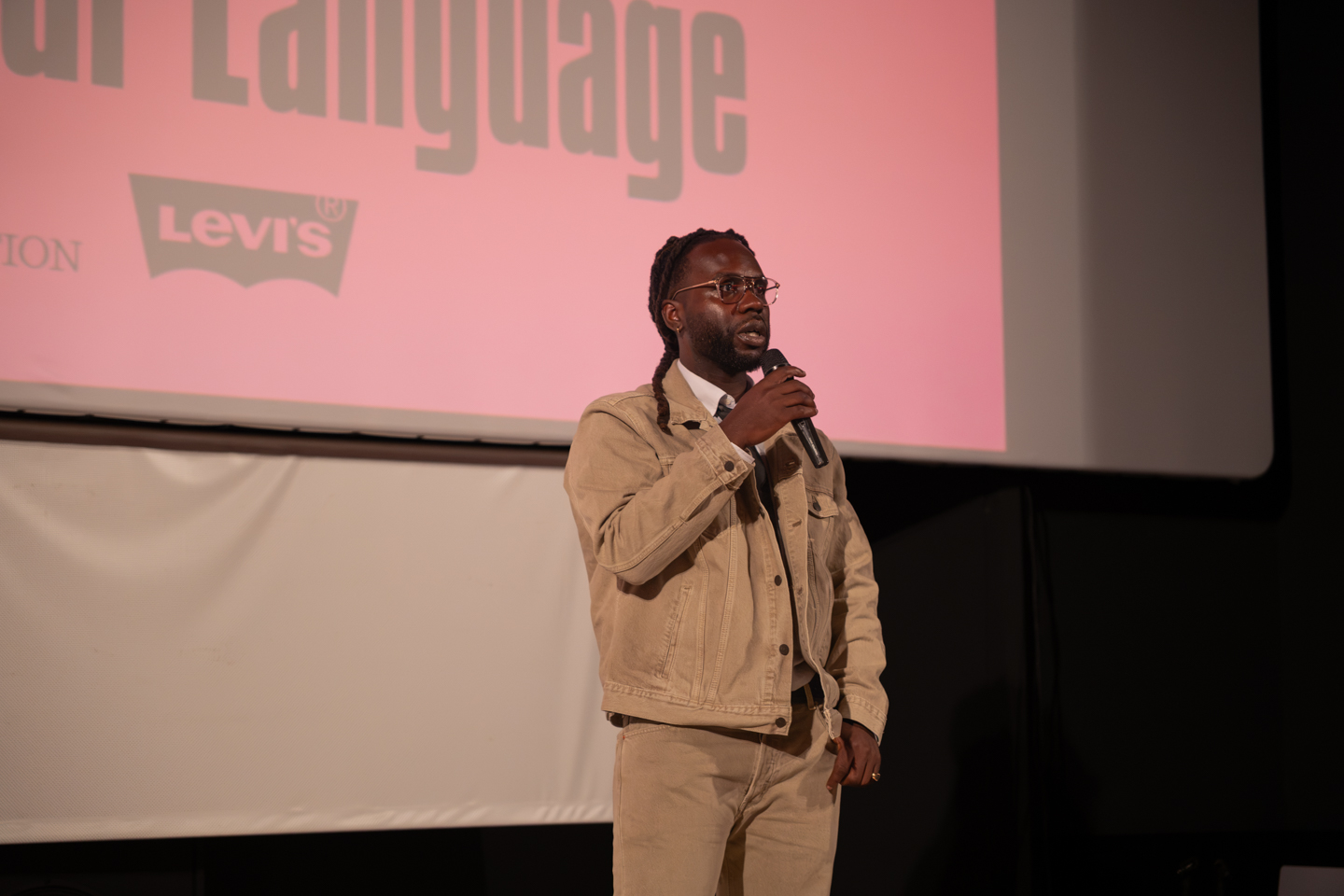 Emmanuel on stage at Milan Fashion Week: Our Blog: LFA MA Filmmaking Alumnus Emmanuel Ektipah Blay Creates Levi’s and Afro Fashion Association Documentary for Milan Fashion Week